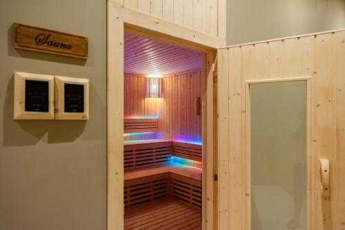 a sauna with colored lights inside of it at Z Exquisite Koh Samui Domain with Infinity Pool in Nathon Bay