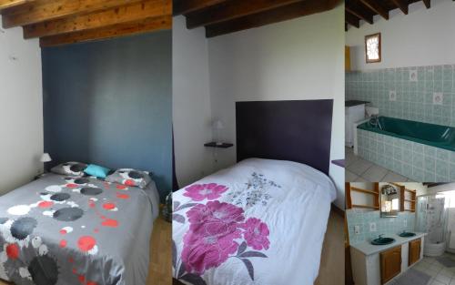 ein Schlafzimmer mit einem Bett mit Blumen darauf in der Unterkunft Entre Terre et Mer in Oye-Plage