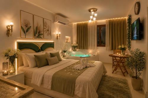 a bedroom with a large bed and a bath tub at panorama pyramids and jacuzzi in Giza
