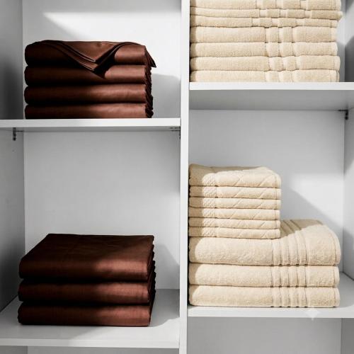 four different images of towels in a closet at Busheti Home in Telavi