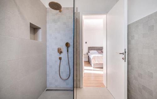 a bathroom with a shower with a glass door at Villa Tea Polača Biograd na moru Benkovac in Polača