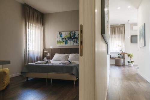 a bedroom with a bed in a room at I Segreti della Valle in Agrigento