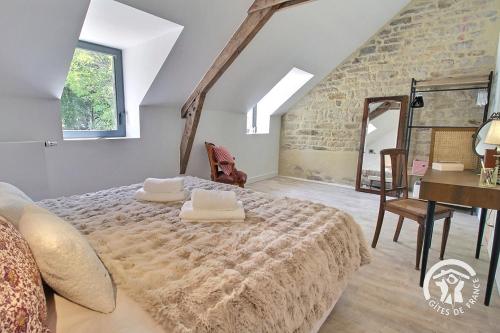 Llit o llits en una habitació de Kerdaniel