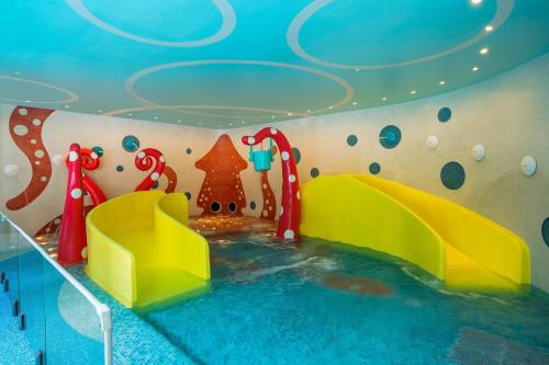 a childrens room with a pool in the water at Meliá Pattaya Hotel in Pattaya