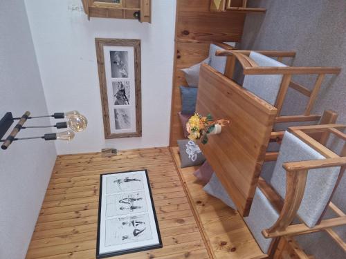 a room with stairs and a picture on the floor at Apartment Apt A 086 by Interhome in Disentis