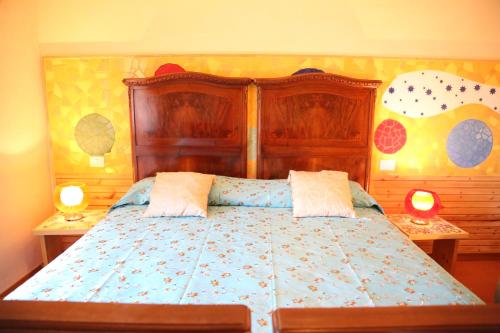 Ein Bett oder Betten in einem Zimmer der Unterkunft Albergo Ristorante Cavaliere