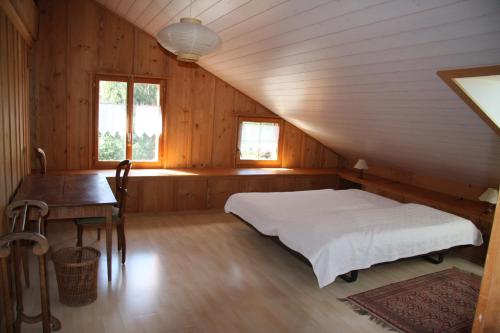 A bed or beds in a room at Le Polder