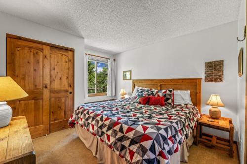 a bedroom with a bed and a window at Wood Duck in Clark