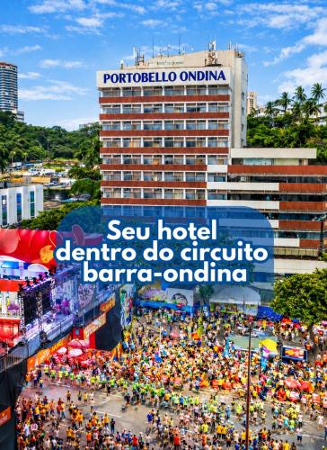 a large crowd of people standing in a city at Portobello Ondina Praia in Salvador