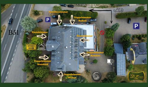a map of a building with arrows on it at Zenners Landhotel in Newel