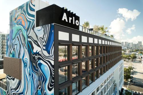 a building with a mural on the side of it at Arlo Wynwood Miami in Miami