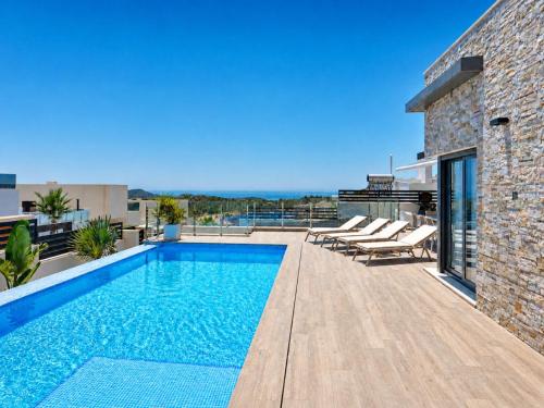 a swimming pool on the roof of a house at Hillside Luxury Villas by NRAS in Finestrat