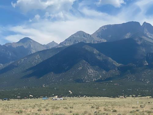 a view of a mountain range with mountains in the background at The Crestone Hideaway in Crestone