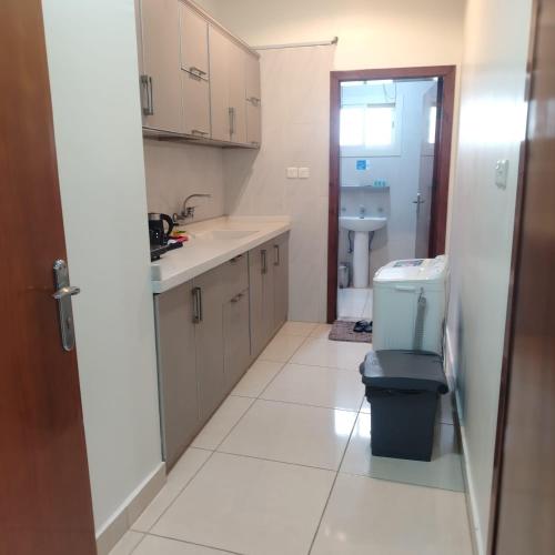 a small bathroom with a sink and a toilet at دار الباحة فرع رقم 2 in Al Baha