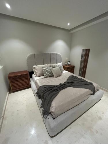 a bedroom with a large bed in a room at Departamento Pacific Luxury Punta Mita, Beachfront in Higuera Blanca