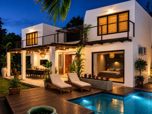 a house with a swimming pool in front of it at Casa La Rayanna in Palomino