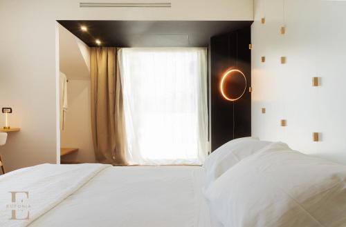Llit o llits en una habitació de Eufonia