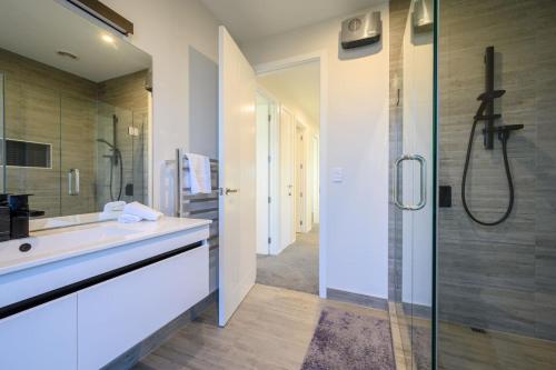 a bathroom with a sink and a shower at 31 on Boundary in Twizel
