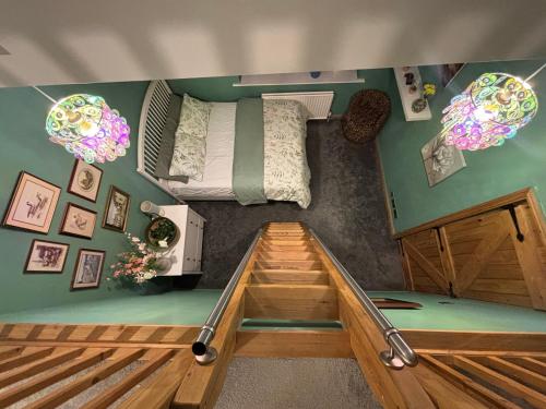 a room with a bed and a bunk bed in a room at Batty lodge in Cockerham