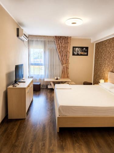 เตียงในห้องที่ DNY Comfort Apart