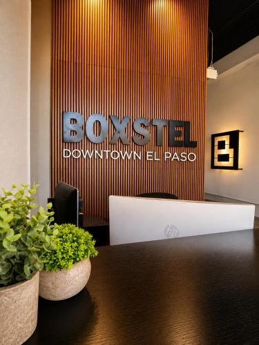 an office with a table and a laptop on a wall at Boxstel - Modern Stay Hotel Downtown El Paso in El Paso