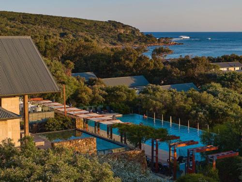 an aerial view of a resort with a swimming pool at Pullman Bunker Bay Resort Margaret River in Dunsborough