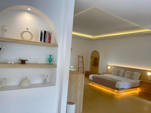 a bedroom with a bed in a room at Tonsak Resort in Ko Samed