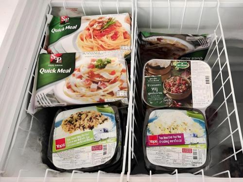 a refrigerator filled with different food items inefficiencies at Iyara Residence in Trat