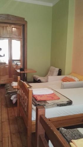 a room with a group of beds in it at Hello Sofia Guesthouse in Sofia