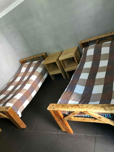 Postel nebo postele na pokoji v ubytování Machubi