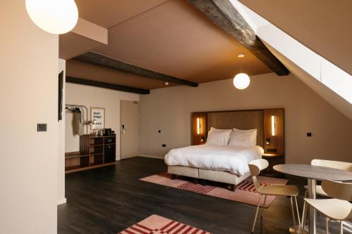 Ένα ή περισσότερα κρεβάτια σε δωμάτιο στο Hotel Vrythof - just a room - digital key by email or SMS