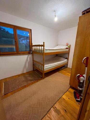 a small room with a bunk bed in it at Relax home in Travnik