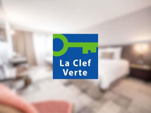 a sign that reads la gift serrite in a living room at Mercure Bordeaux Lac in Bordeaux