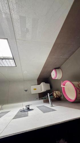 a bathroom with a sink and a mirror at Siddhi farm in Kolhapur
