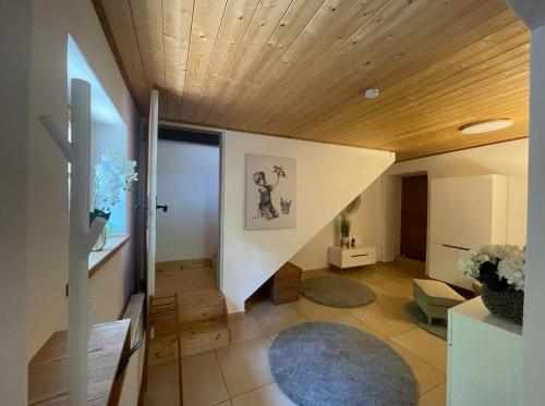 a hallway of a house with a wooden ceiling at Chalet Notschkerl in Waasen