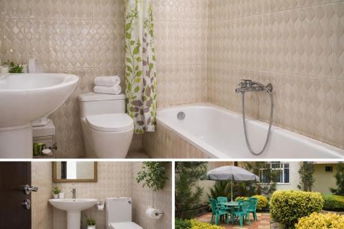 a bathroom with a tub and a toilet and a sink at Avi Guest House in Addis Ababa