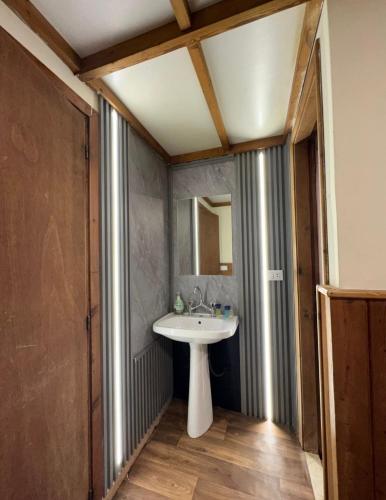 a bathroom with a sink and a mirror at Mon Refuge 111-110 in Bcharré