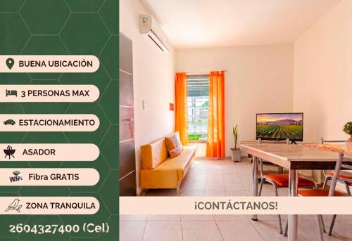 a living room with a table and a tv at Departamentos Brown -WiFi 100 MB - Cochera - Parrilla - Aire - TV Cable in San Rafael