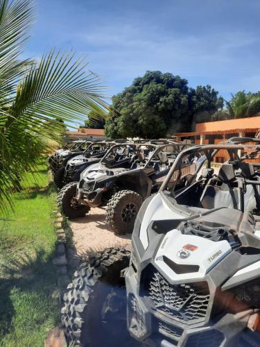 a row of atvs parked in a row at Pousada Jalapão Sunset in Mateiros