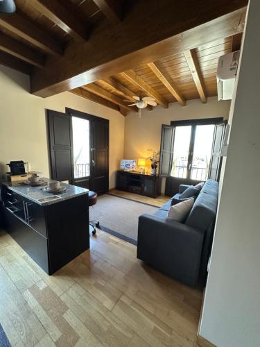 a living room with a couch and a table at Casa dos Acevedo in Verín