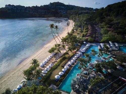 an aerial view of a resort with a beach at Pullman Phuket Panwa Beach Resort in Panwa Beach