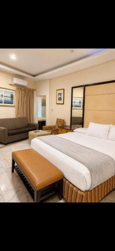 Katil atau katil-katil dalam bilik di Richcastle Hotel
