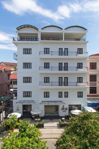 a large white building with a lot of windows at Alba Hotel in Hue