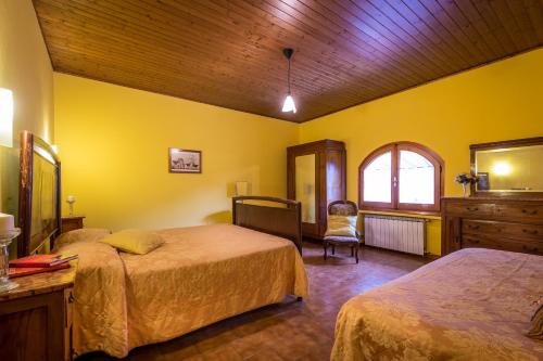 Podere Casalinoにあるベッド
