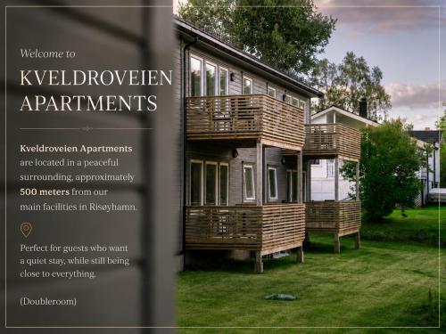 a advertisement for a wooden house in a yard at Risøyhamn Sjøhus AS in Risøyhamn