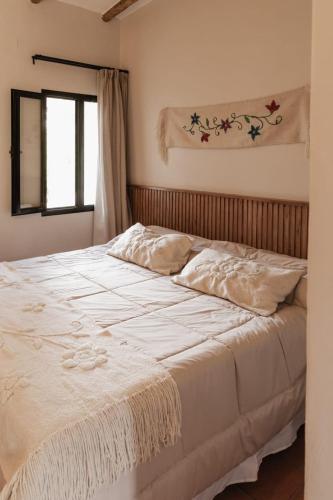 Llit o llits en una habitació de Hotel de Diseño con Desayuno FG Tafí