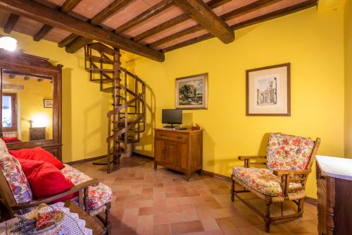 Podere Casalinoにあるテレビまたはエンターテインメントセンター