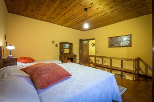 Podere Casalinoにあるベッド
