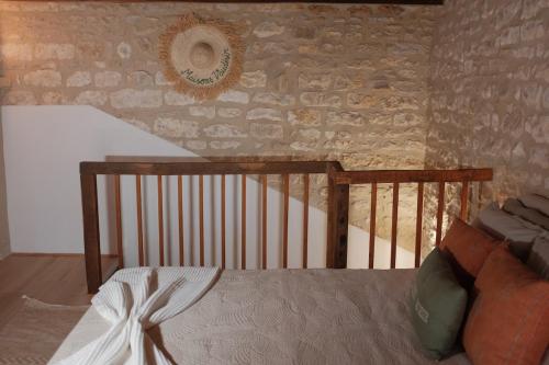 a room with a staircase and a table in a room at Maisons Vaudésir - Lyla, Chablis in Chablis