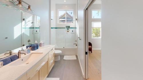a bathroom with a toilet and a sink and a shower at Twice is Nice by AvantStay in Paso Robles